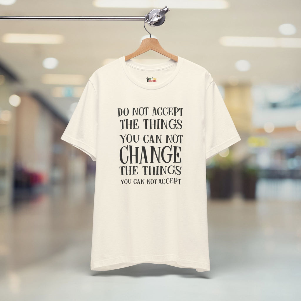 Beige t-shirt with motivational quote on a hanger in a store setting