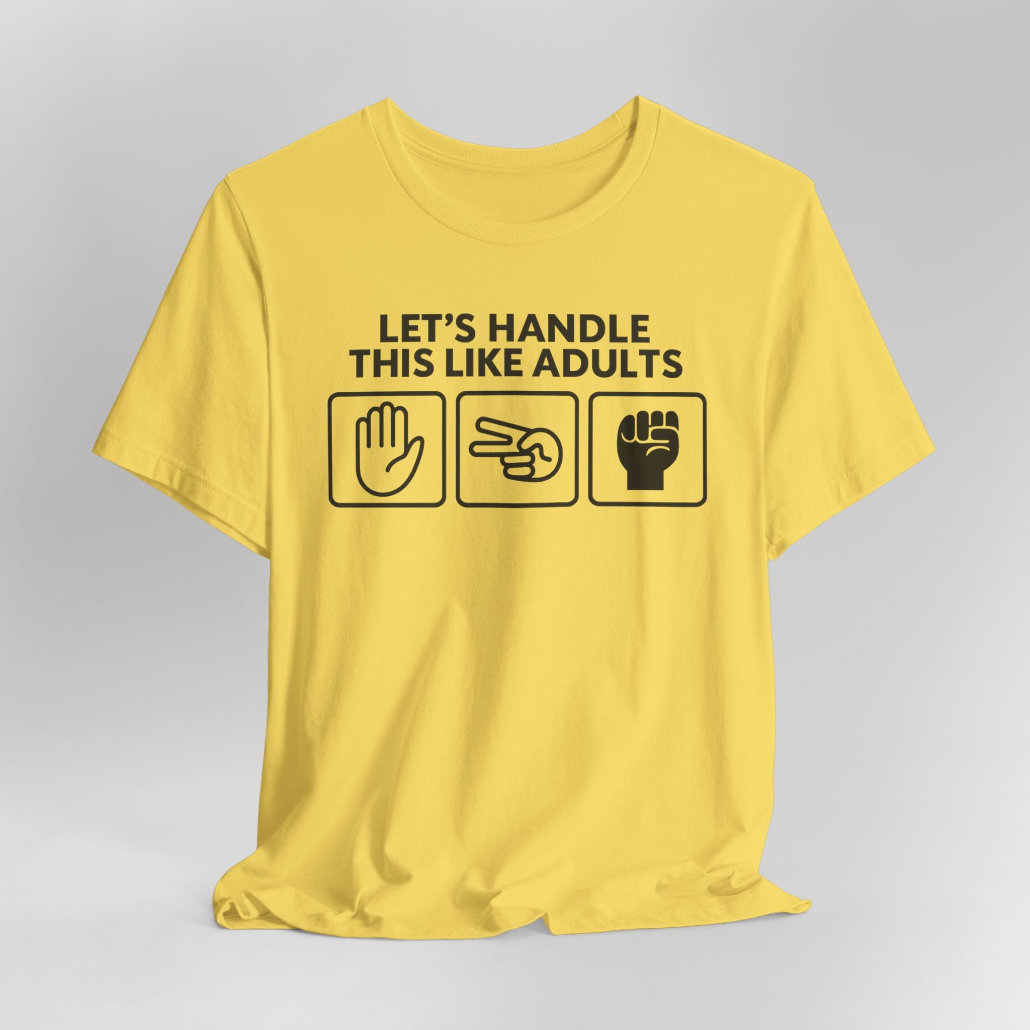 Yellow t-shirt with black text and icons on a gray background