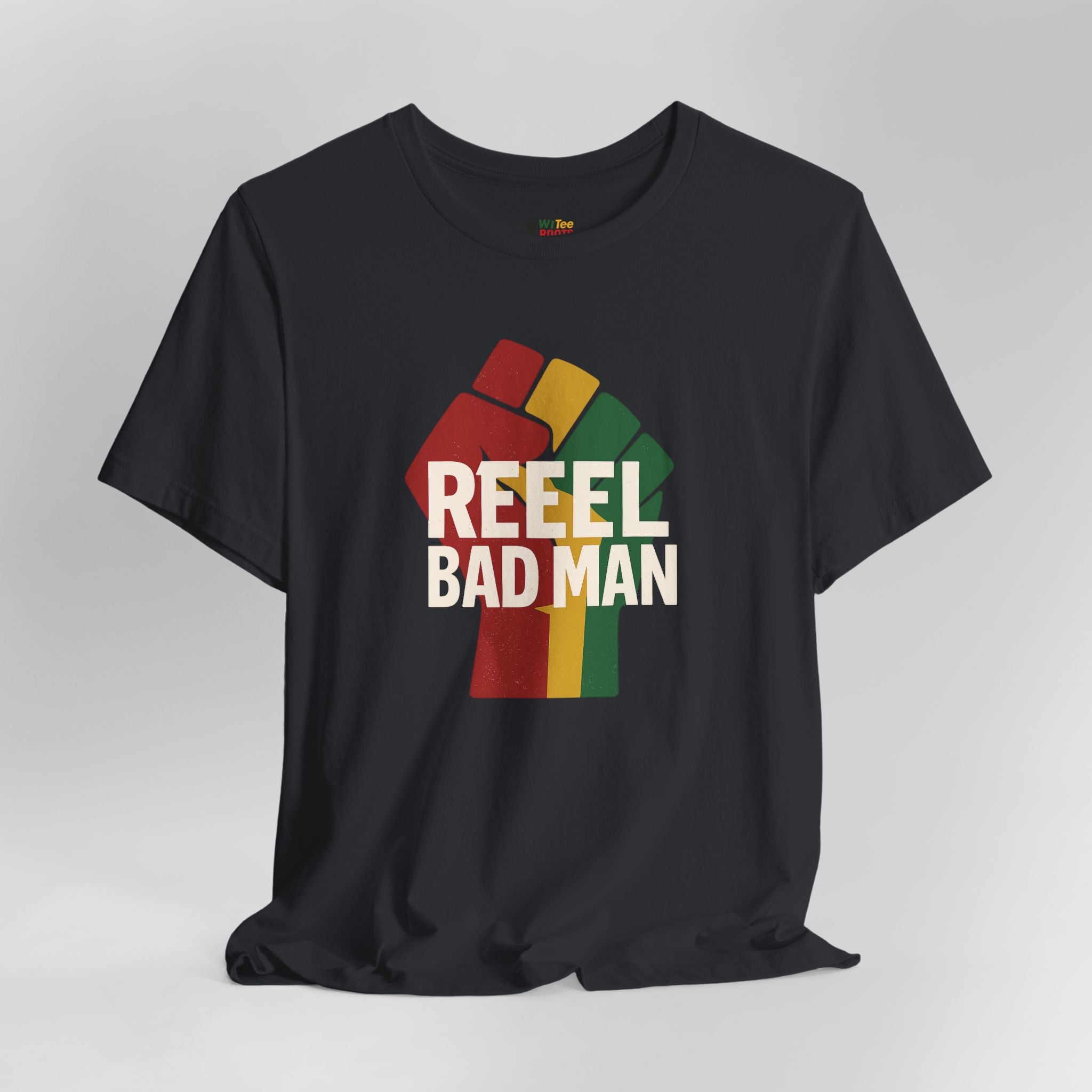 Black t-shirt with colorful graphic and 'REEEL BAD MAN' text on a gray background