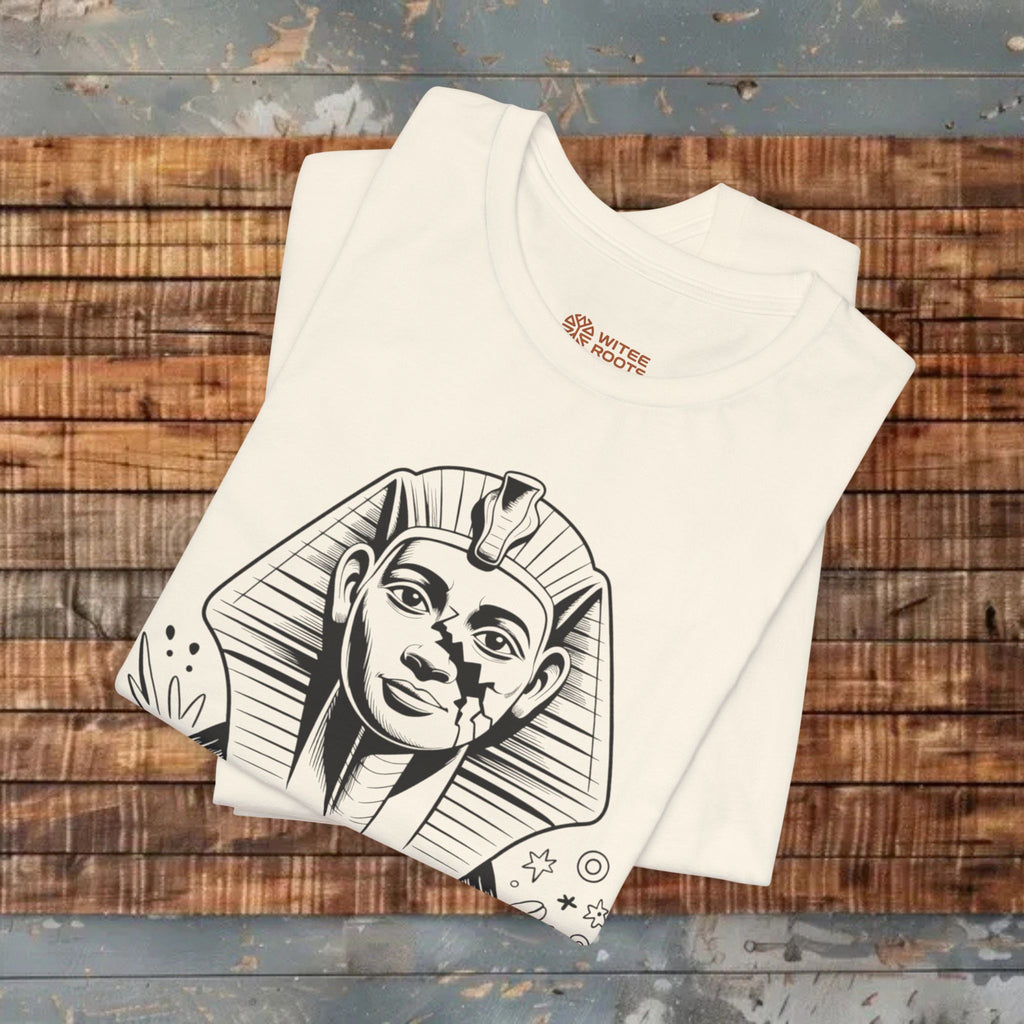Beige  t-shirt with a graphic design on a wooden surface