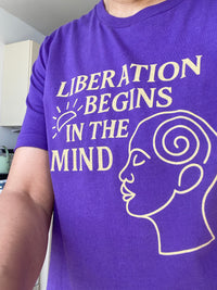 Purple shirt with white text and graphic design
